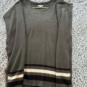 Gray sweater with stripes.